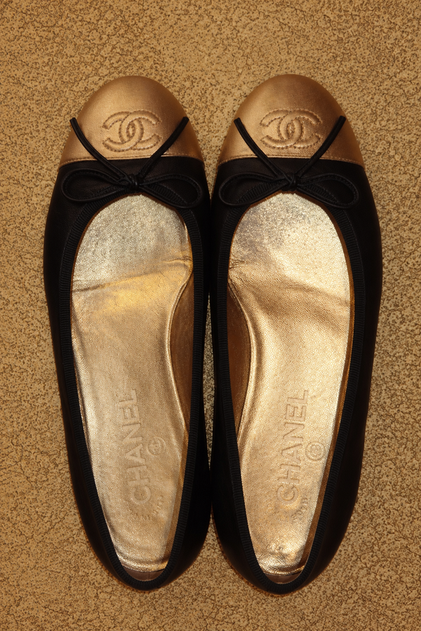 Chanel black and gold ballet flats - vertical photograph 5992