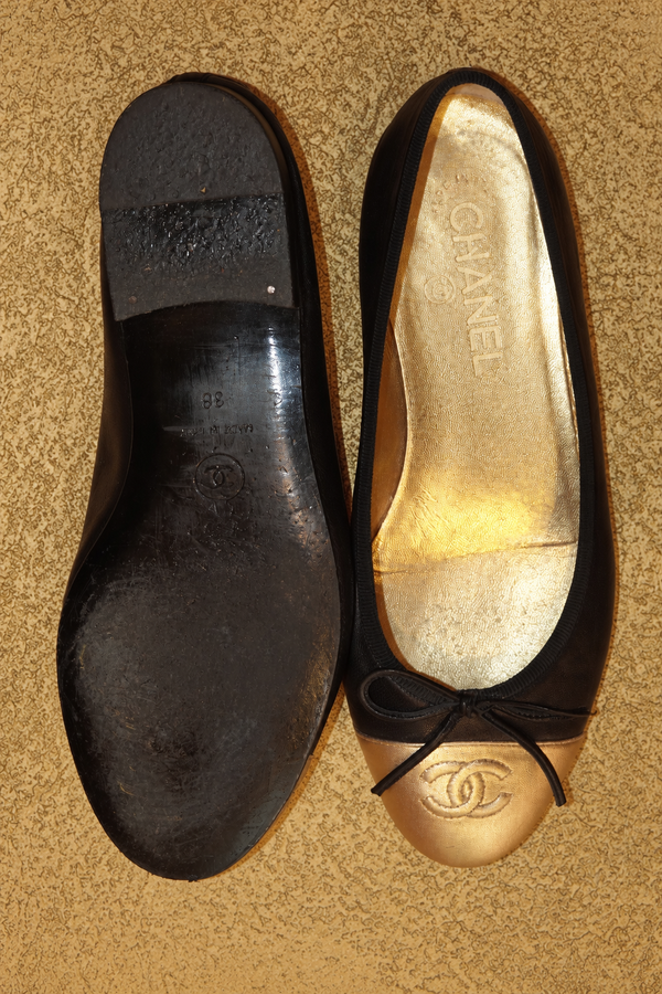 Chanel black and gold ballet flats - vertical photograph 5994
