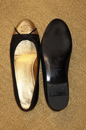 Chanel black and gold ballet flats - vertical photograph 5995