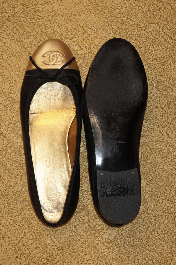 Chanel black and gold ballet flats - vertical photograph 5995