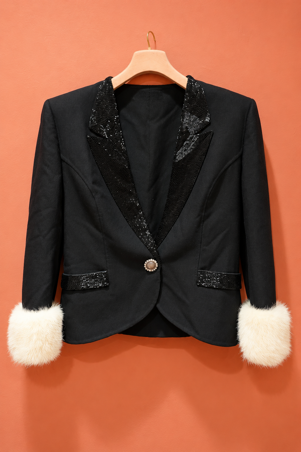 Mila Schön vintage jacket with relaxed fit, styled with jeans and pointed boots; digitally styled